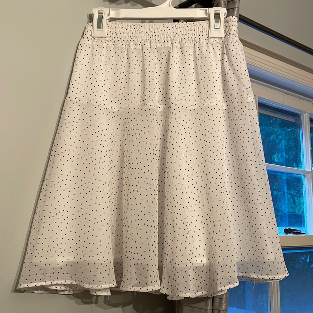 White skirt with black polka dots